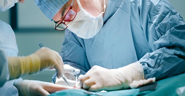 surgeon performing a procedure