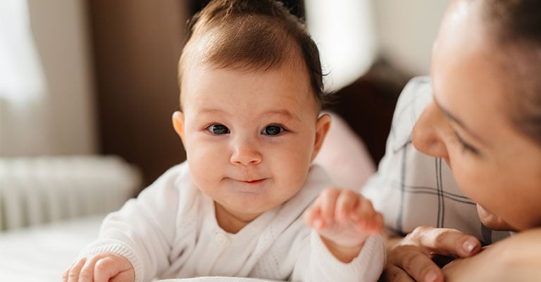 baby-motioning-towards-camera