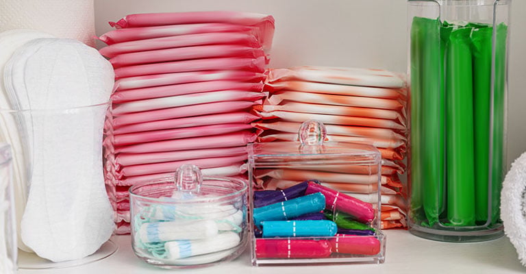 bunch of sanitary pads and tampons