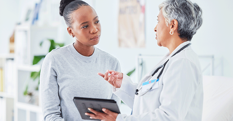 woman listening to her provider explain