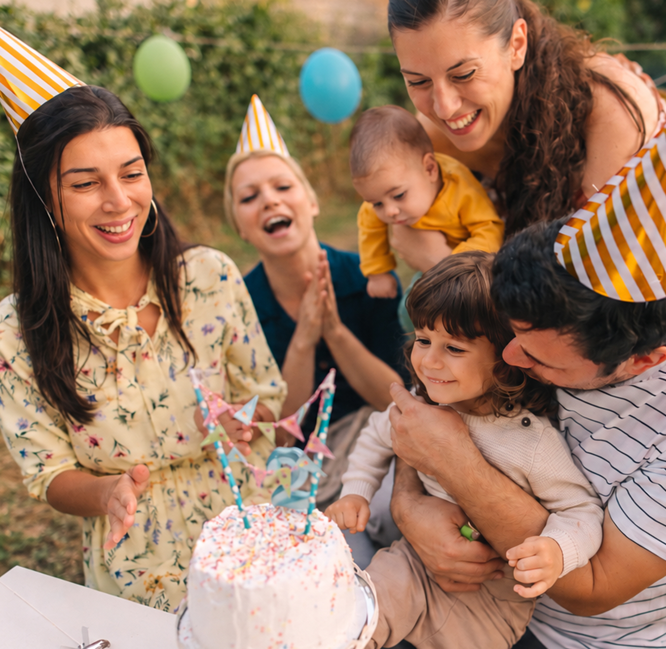 happy family at young girl's birthday party