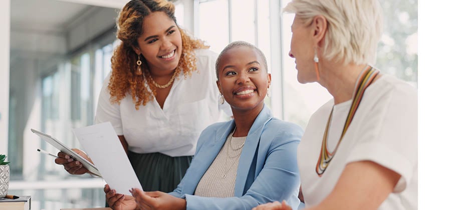 three female colleagues at work