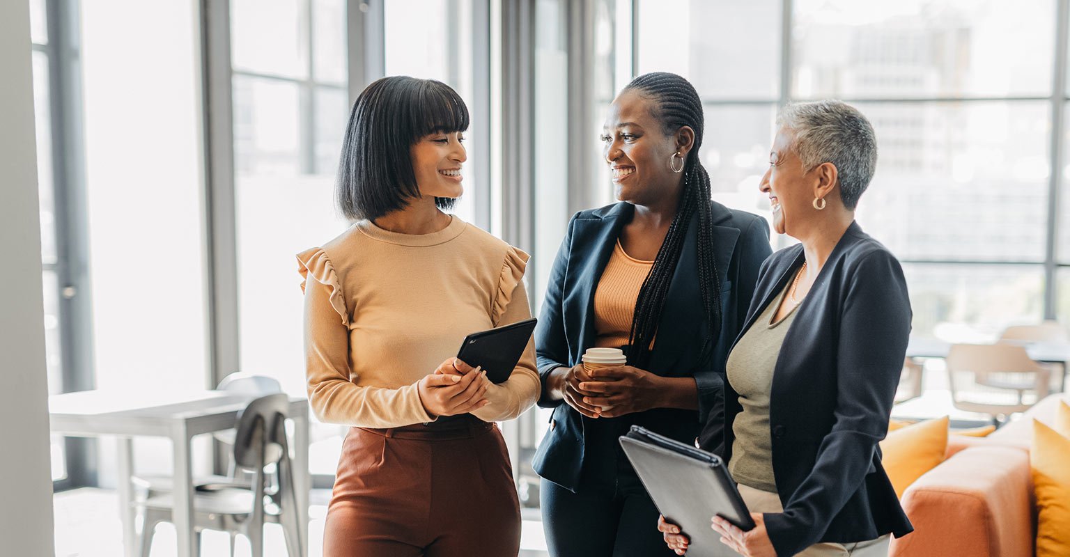 three-businesswomen-walking-in-the-office