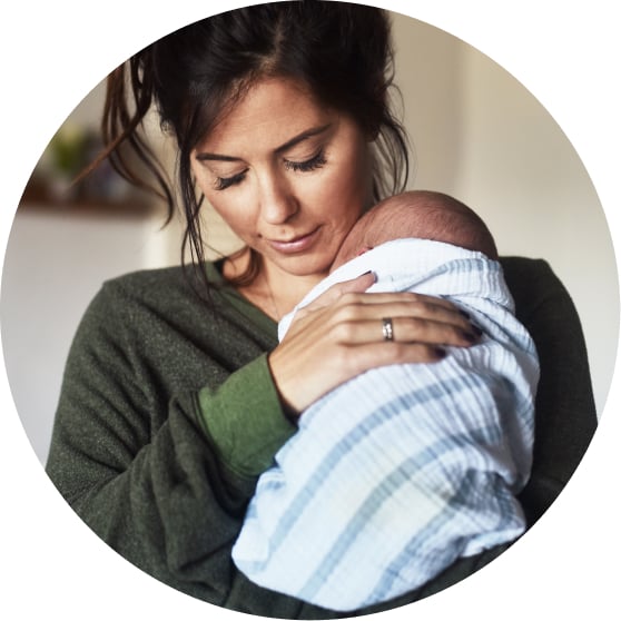 tired mother with newborn