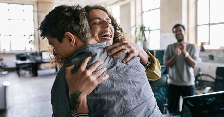 joyful hugging pair