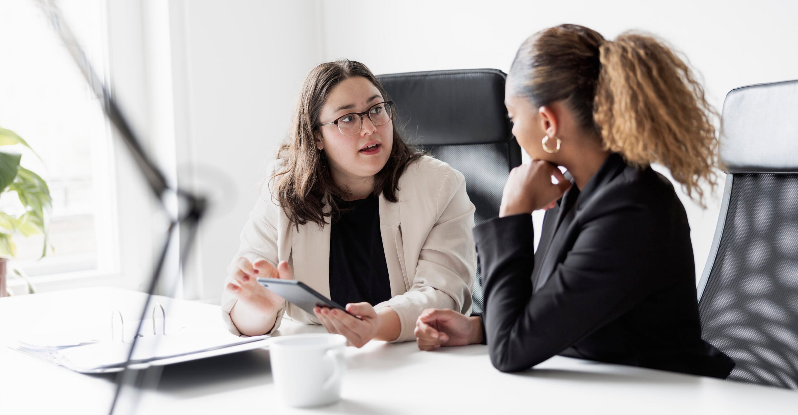 woman deep in discussion with HR at work