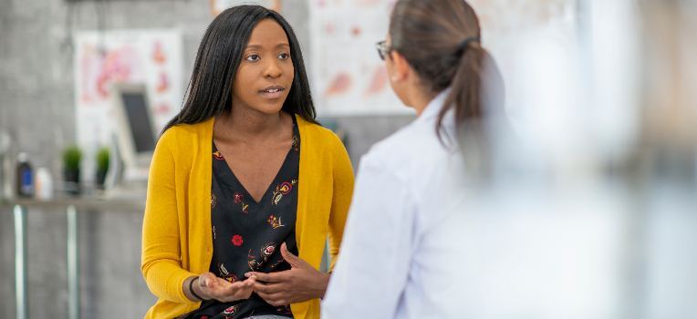 concerned woman talking with provider