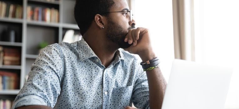 man thinking and looking into the distance