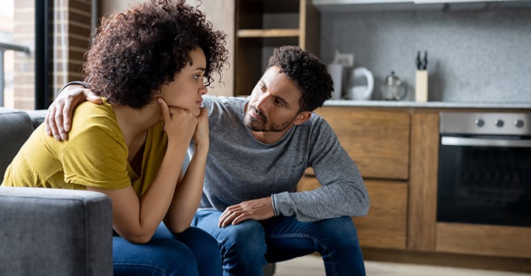 person giving comfort and advice to his partner