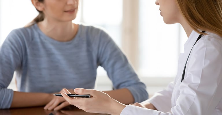 patient listening patiently to her provider