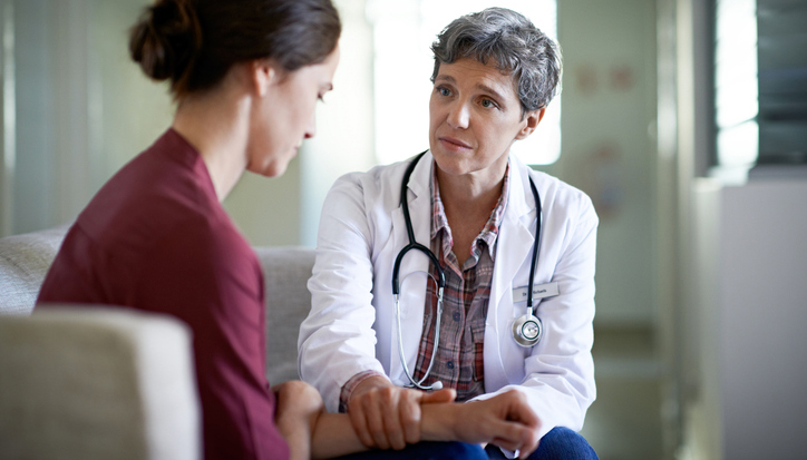 medical provider providing comfort to patient