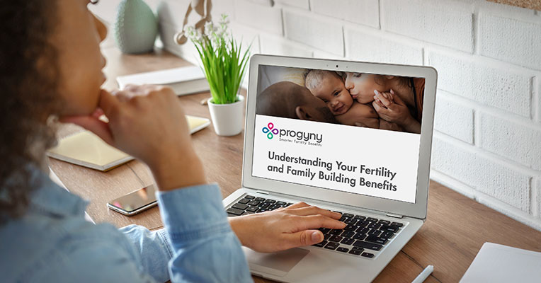 laptop screen featuring info about Progyny Open Enrollment - Understanding Your Fertility and Family Building Benefits