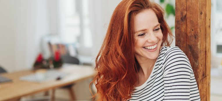 smiling red haired woman