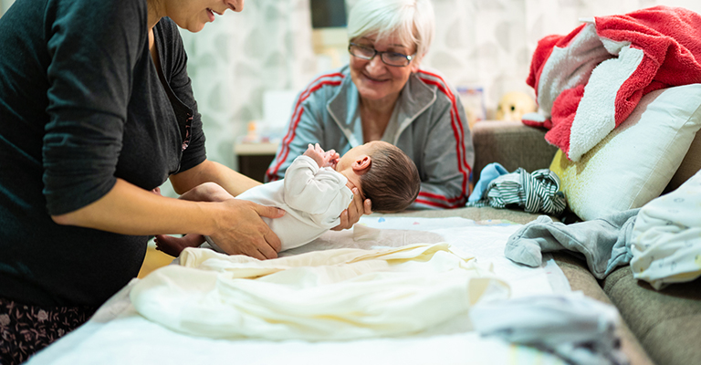 newborn with extended family
