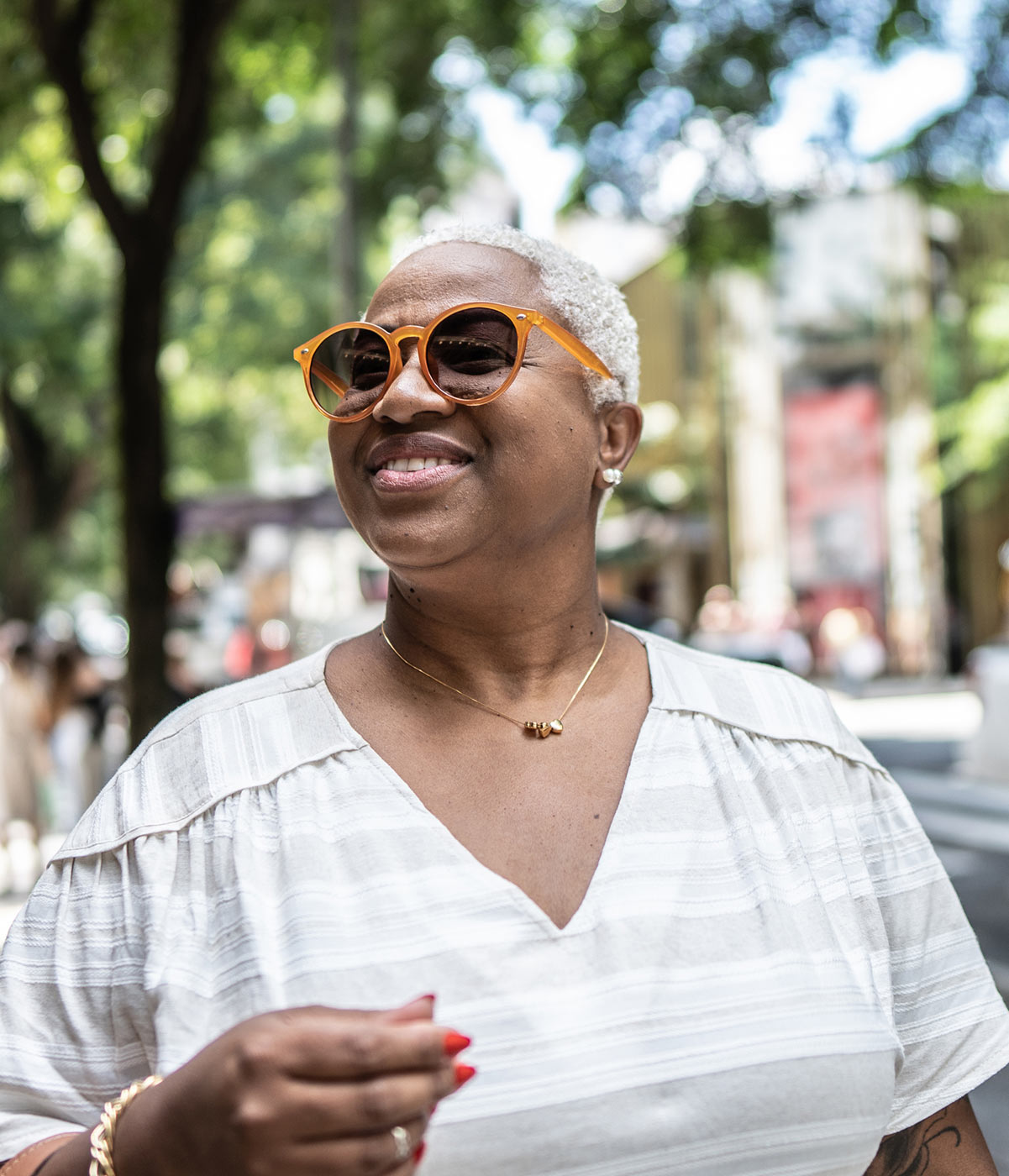 smiling woman with sunglasses
