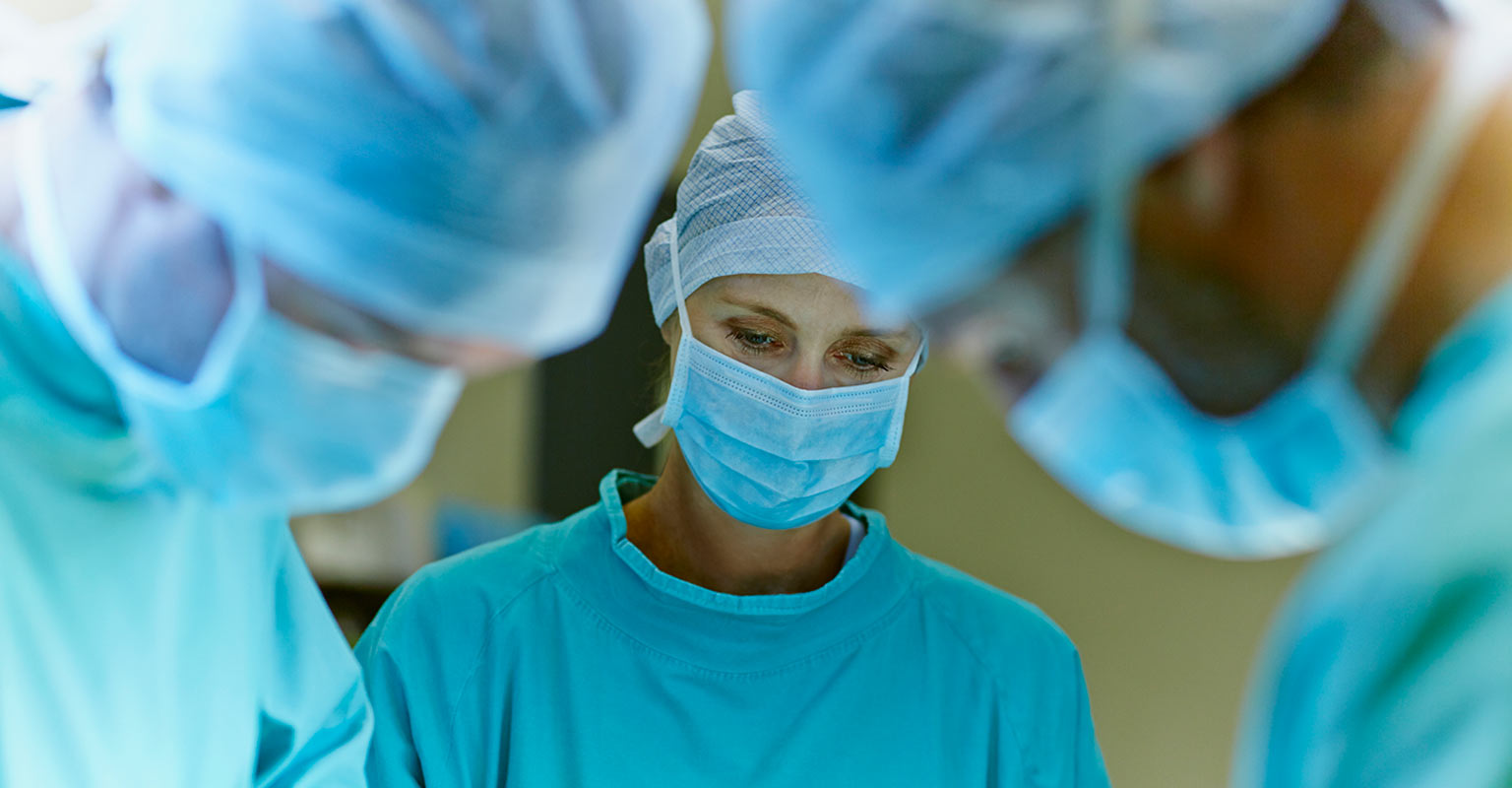surgeons wearing masks prior to reproductive surgeries