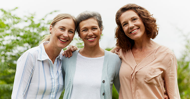 three smiling women