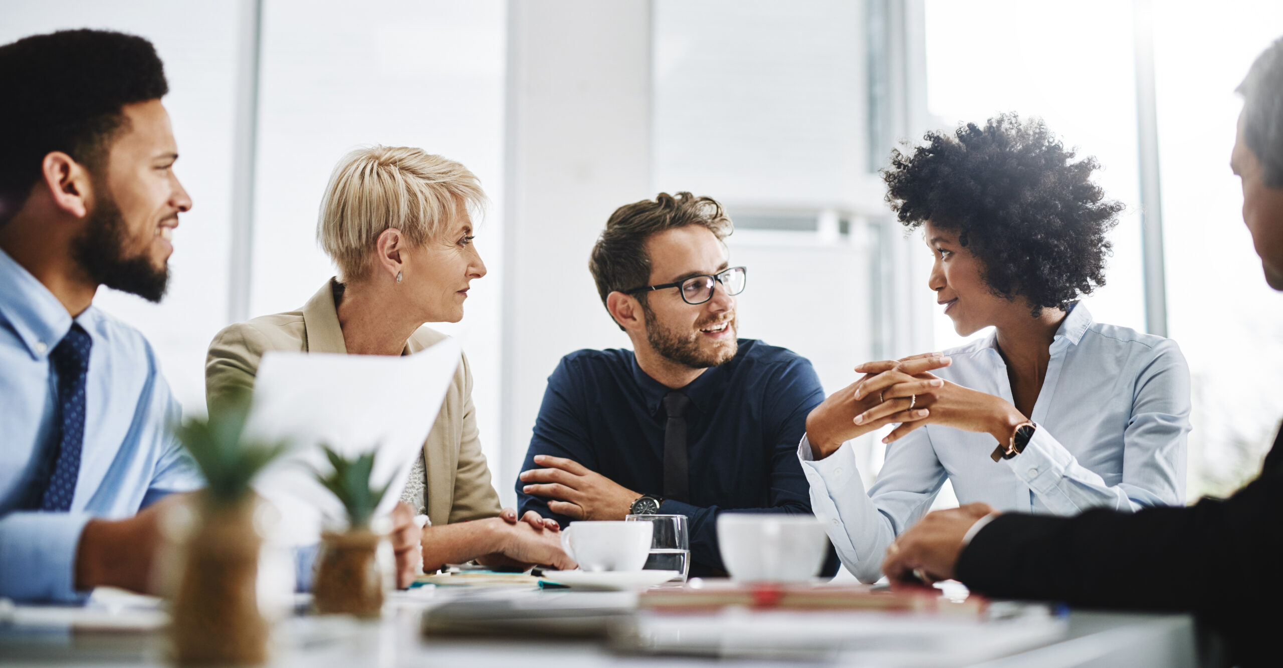 group of employees at a meeting