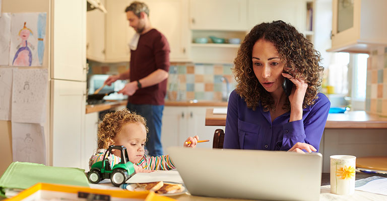 two busy parents with toddler