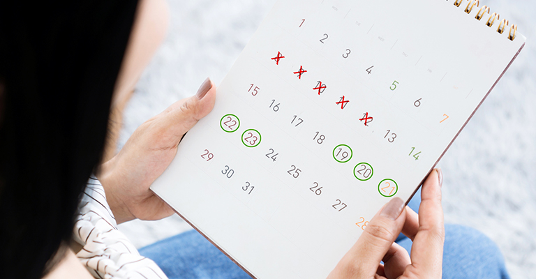 calendar with dates crossed off