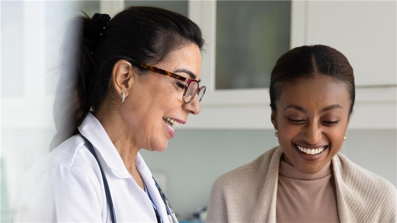 provider laughing with patient