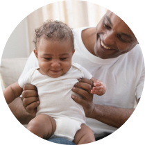 happy baby with father