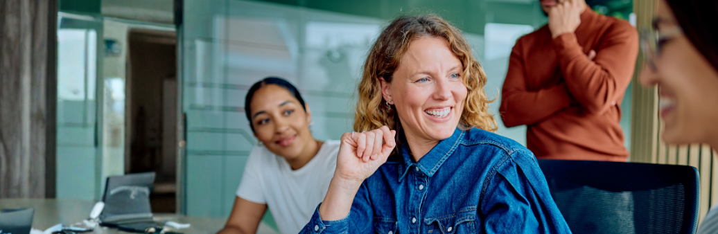 very happy woman surrounded by friends